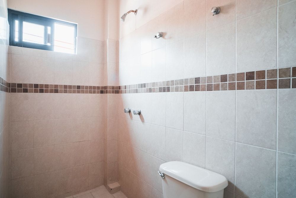 Capital O Hotel Aurora, Tuxtla Gutiérrez Standard Room 8