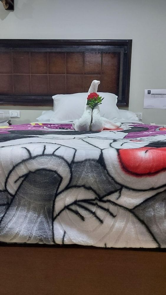 Wassim Boutique Deluxe Triple Room with Garden View 10