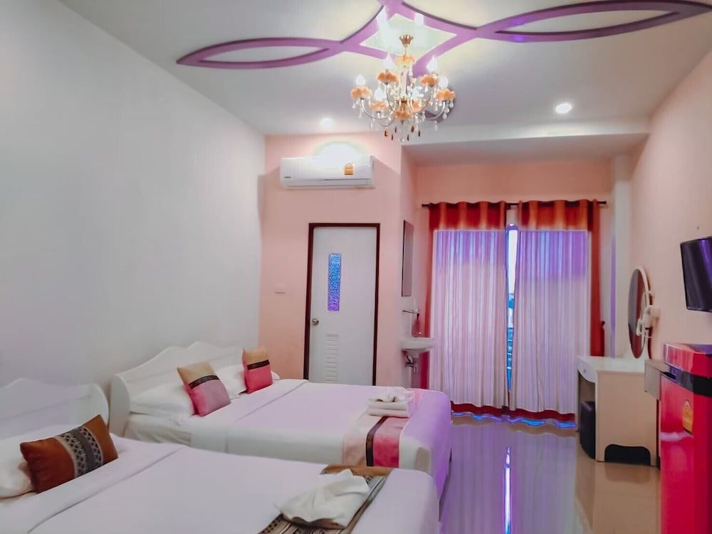 The Linux Garden Hotel Family Single Room, 1 Bedroom, Balcony, Courtyard View 2