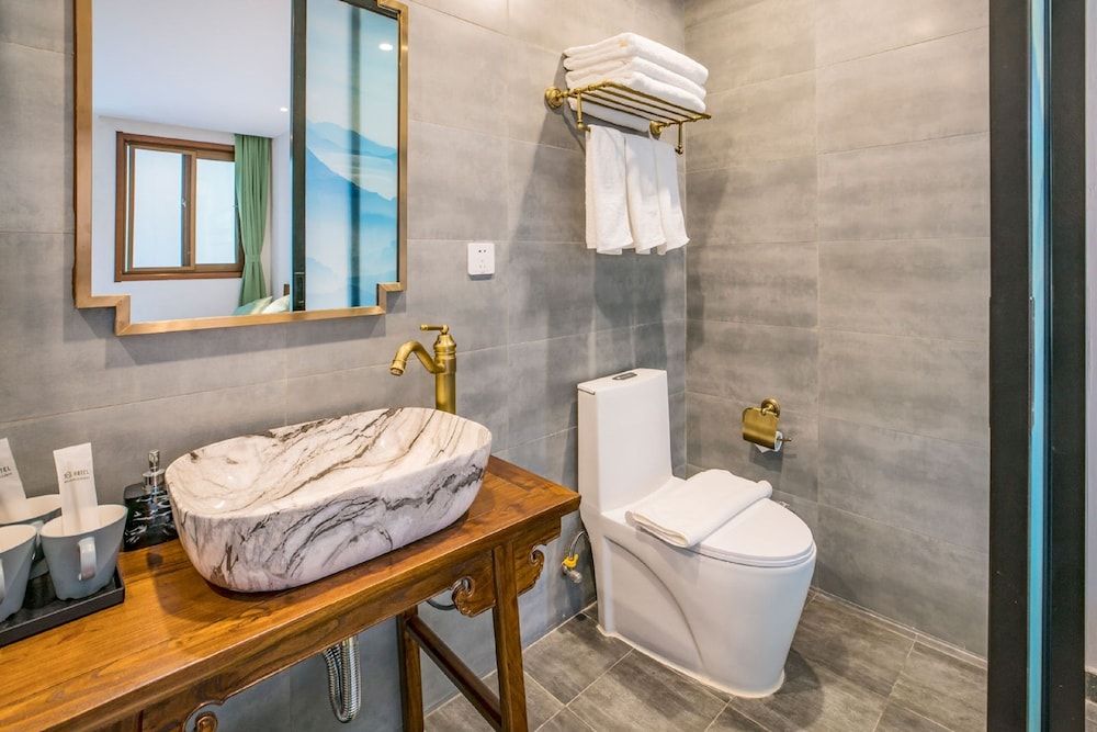 Guipu Courtyard Hotel Deluxe Family Room 7