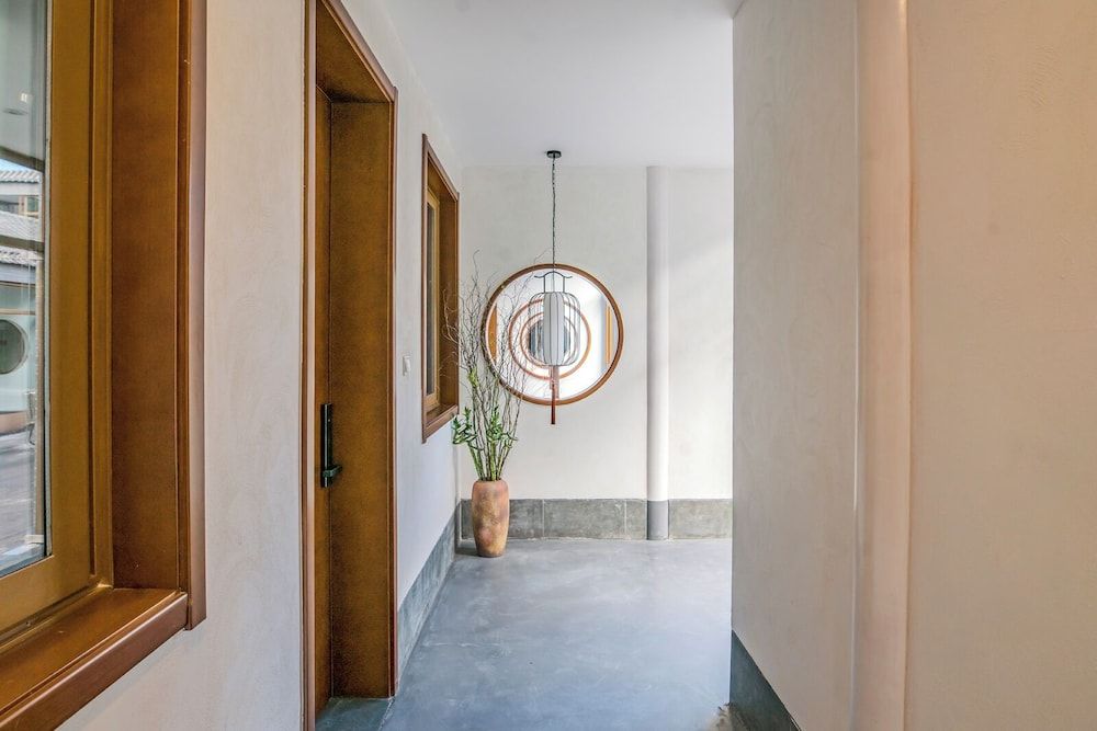 Guipu Courtyard Hotel Deluxe Family Room 8