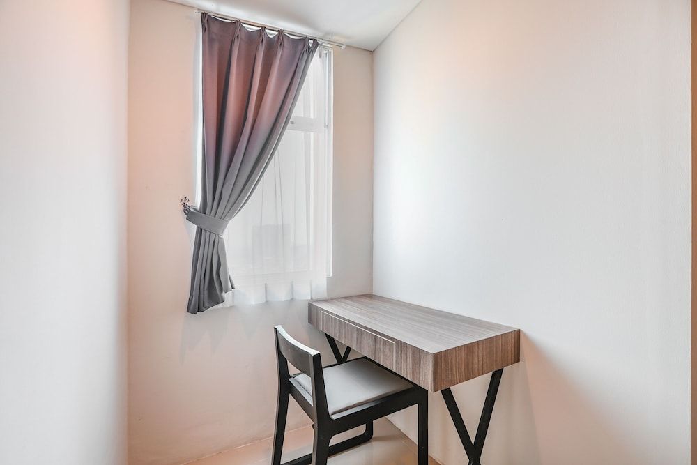 SUPER OYO Collection O 16 Vittoria Residence Deluxe Twin Room 7