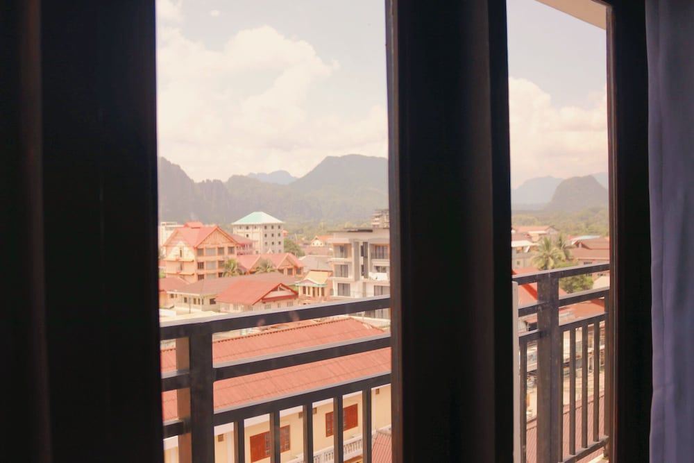 Consiana Vang Vieng Hotel Deluxe Triple With Balcony Mountain View 3