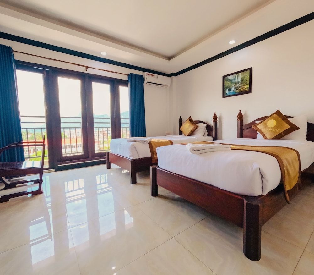 Consiana Vang Vieng Hotel Deluxe Twin Room With Balcony 3