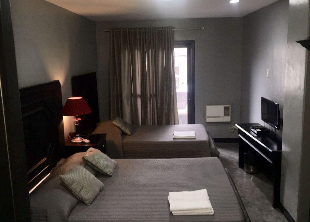 Hotel Capada Family Room w/ Balcony 3