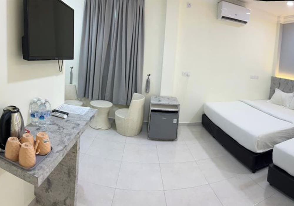 D'Lima Beach Inn Family Room, Garden View 10