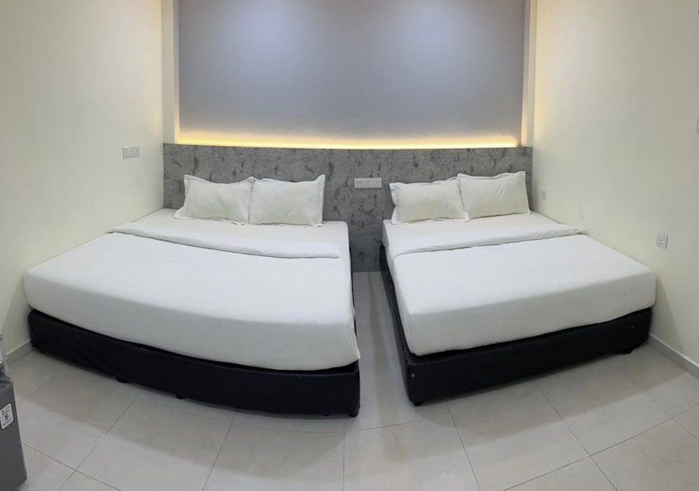 D'Lima Beach Inn Family Room, Garden View 3