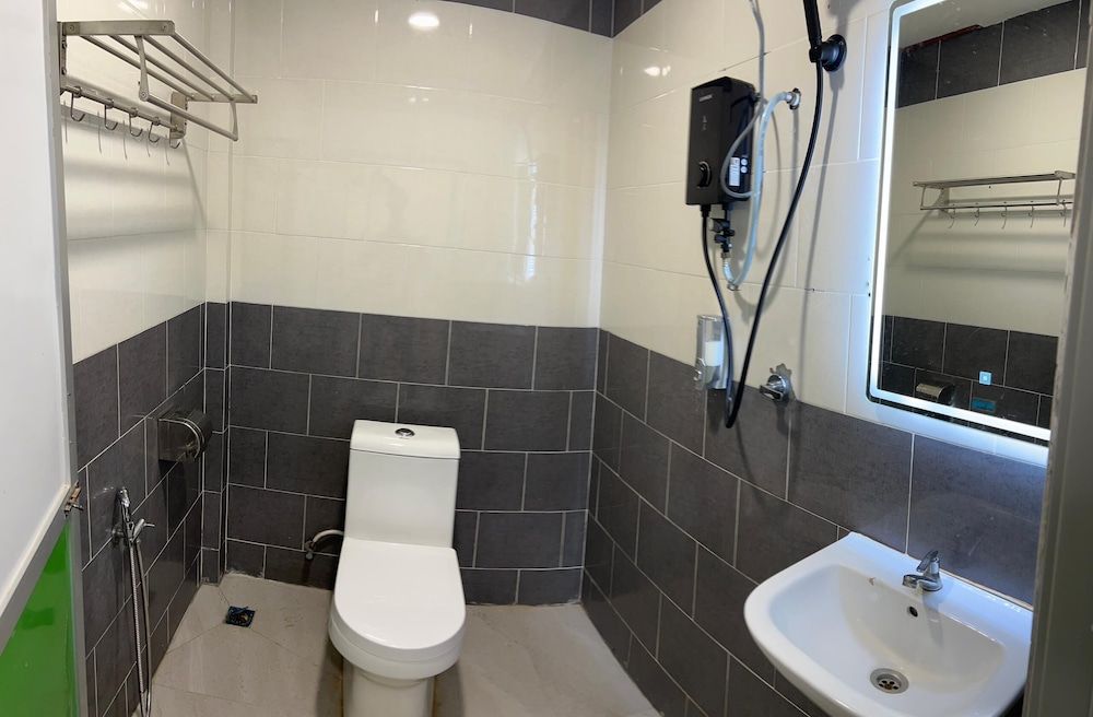 D'Lima Beach Inn Family Room, Garden View 8