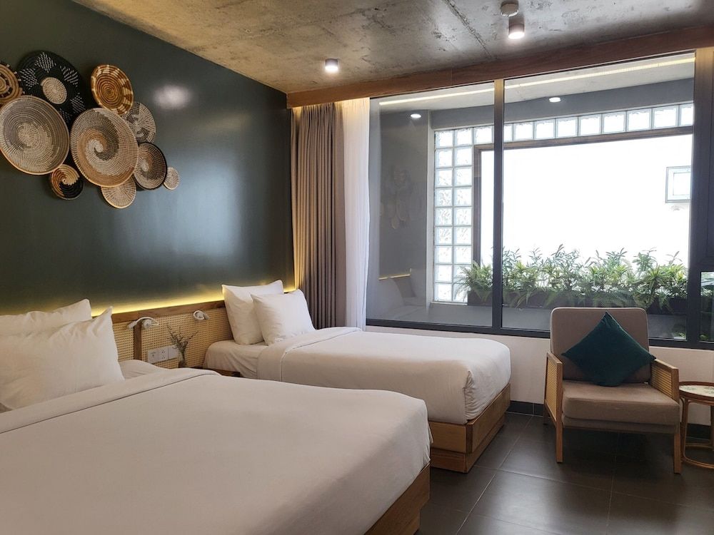 Leaf Beachfront Hotel Da Nang Deluxe Triple Room