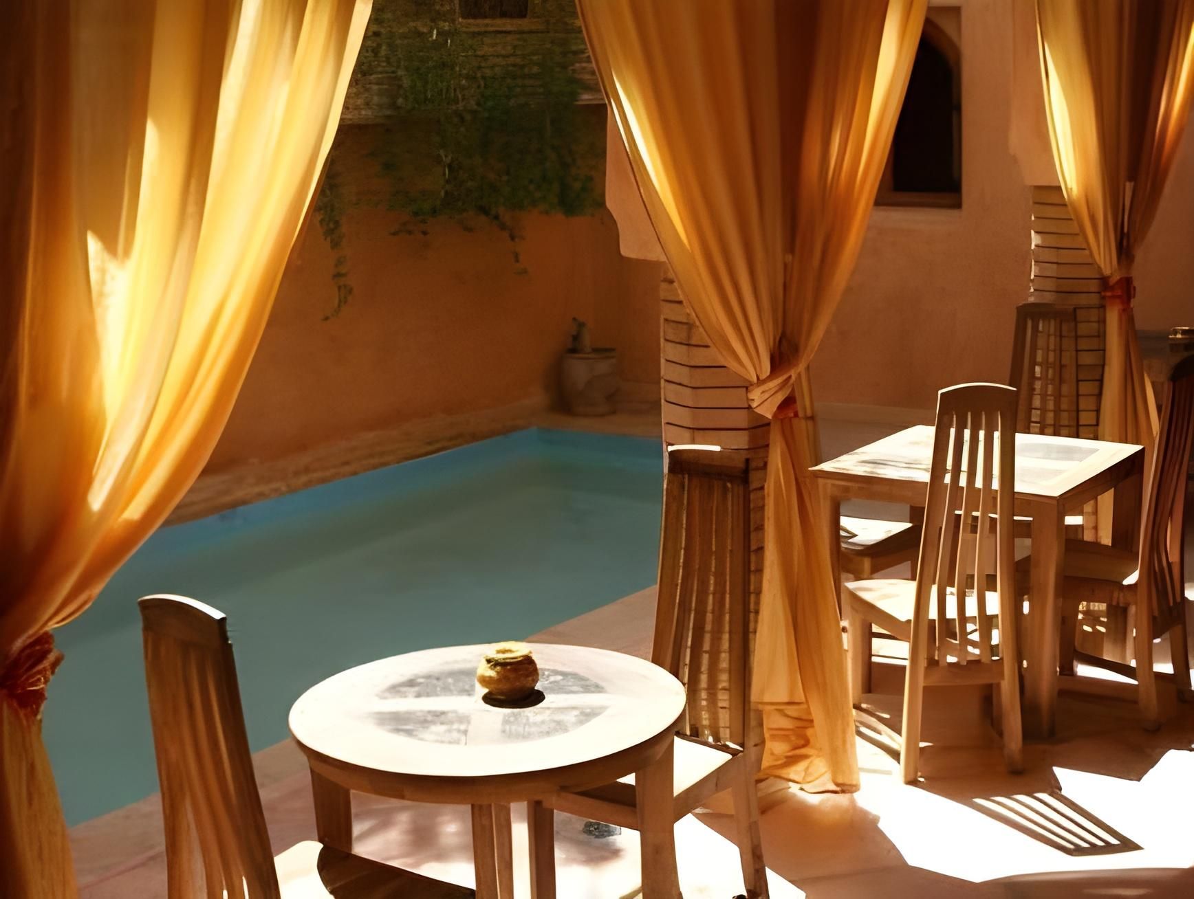 undefined Riad Azenzer 8