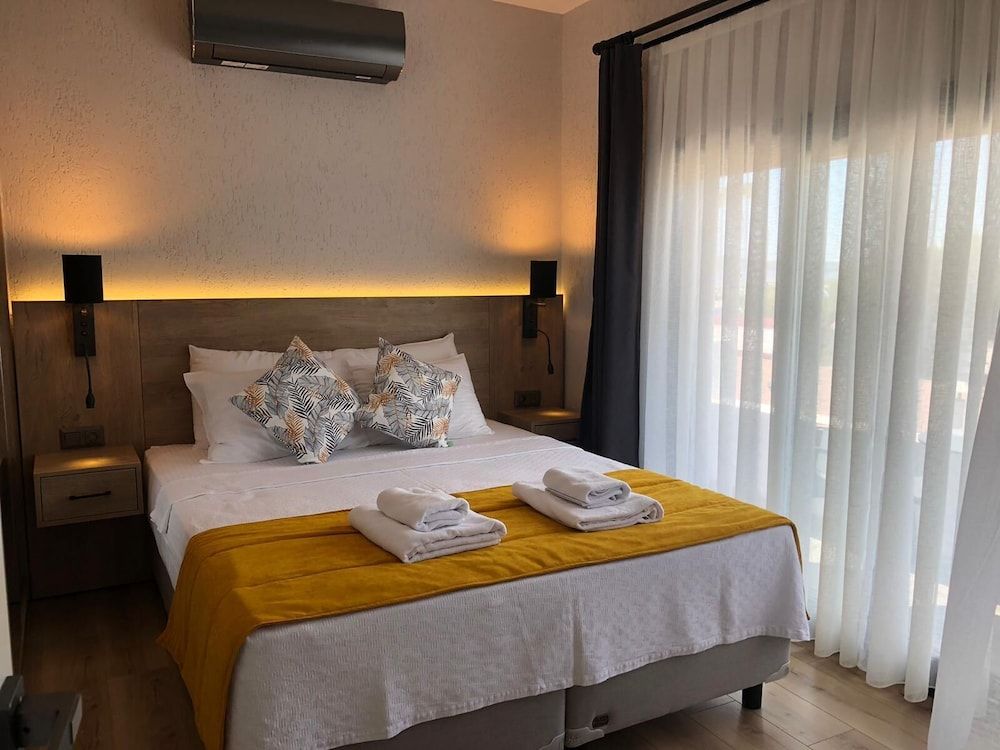 undefined Ali's Hotel Beach 4