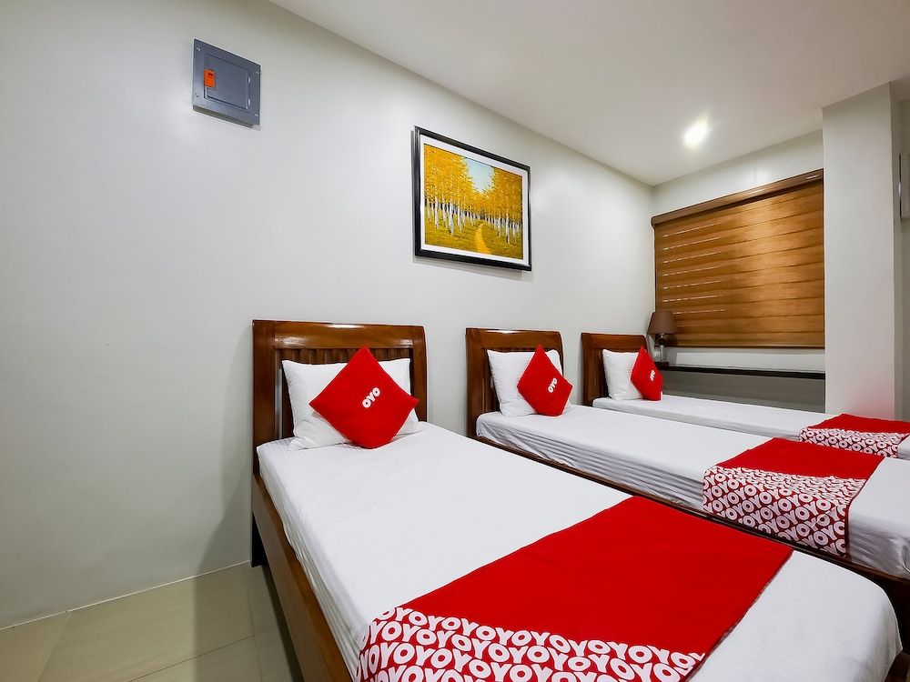OYO 793 Dg Budget Hotel Standard Triple Room 6