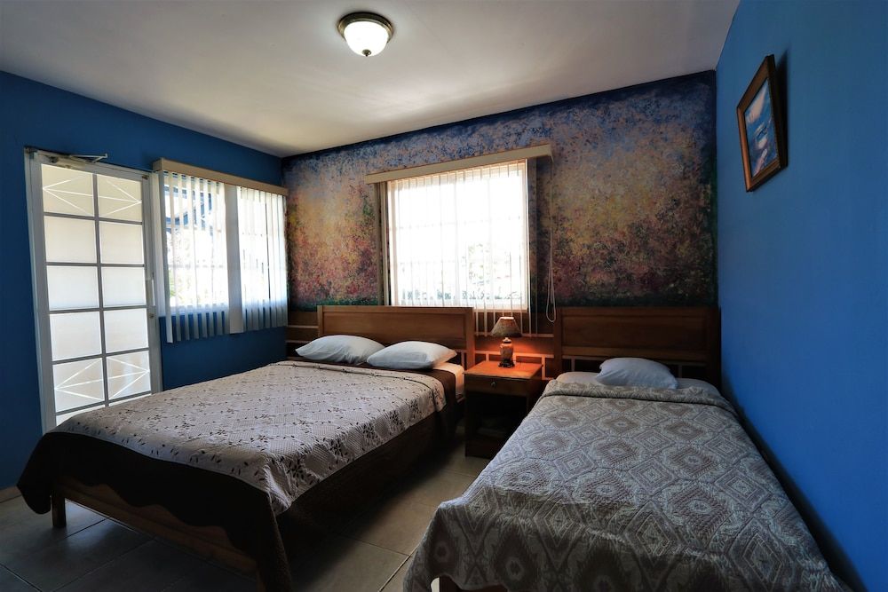 Queen and 1 Twin Room, Sea View, Balcony