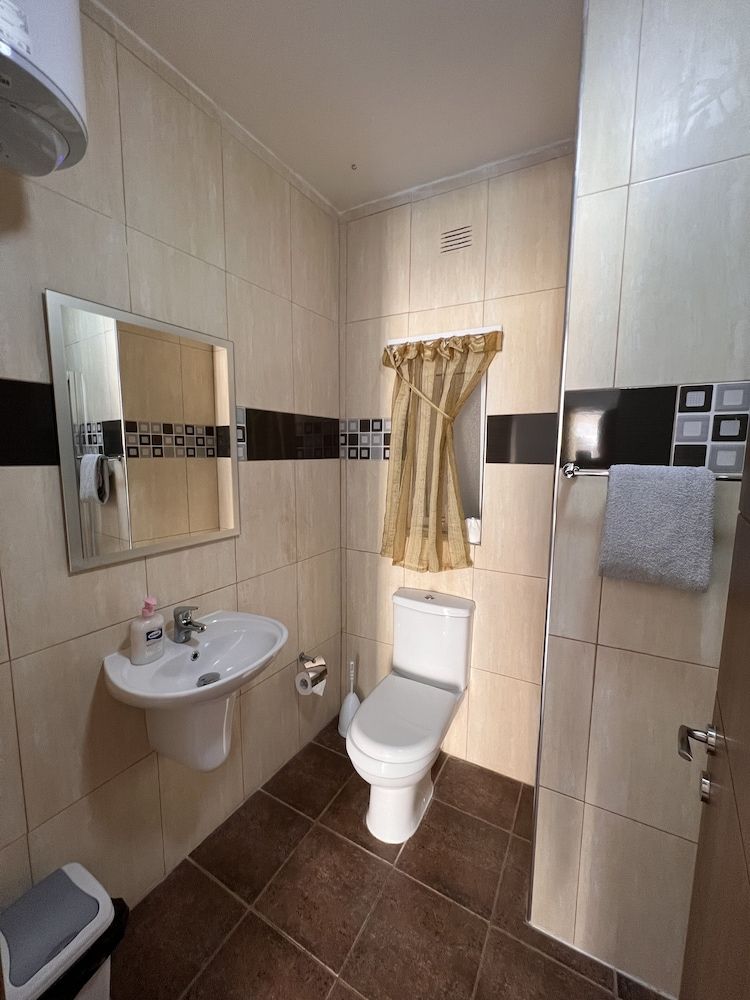 All Nations Holiday Home Family Triple Room, Balcony, City View 11