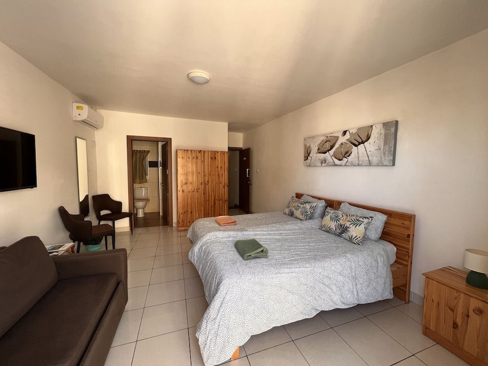 All Nations Holiday Home Family Triple Room, Balcony, City View 3