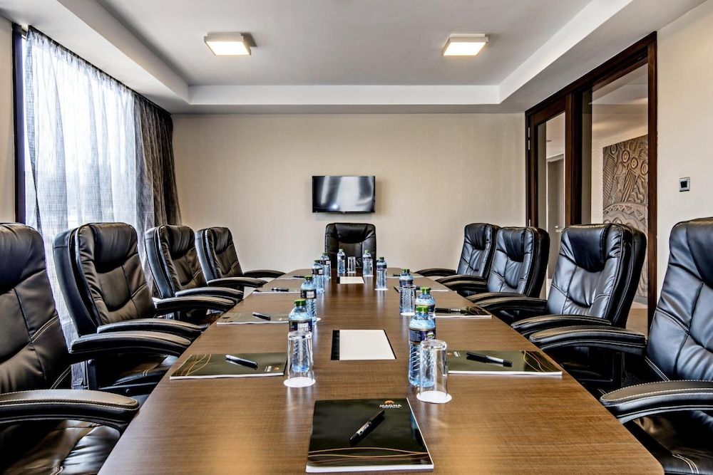 undefined Magna Hotel and Suites 9