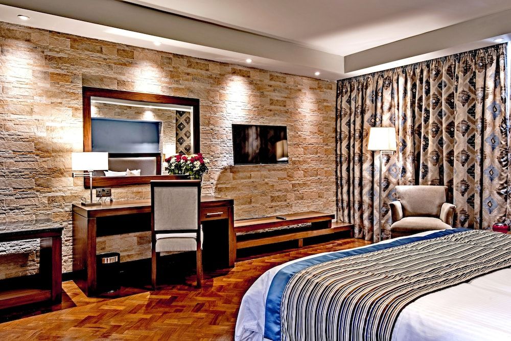 undefined Magna Hotel and Suites 2