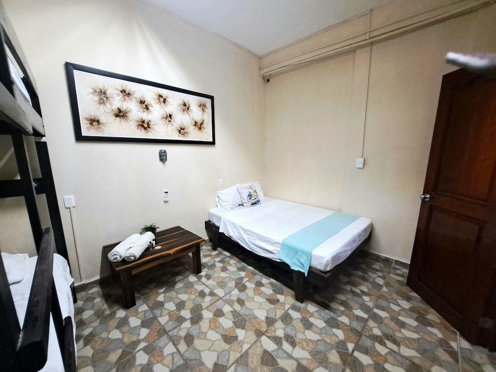 Economy Quadruple Room, Non Smoking, Shared Bathroom