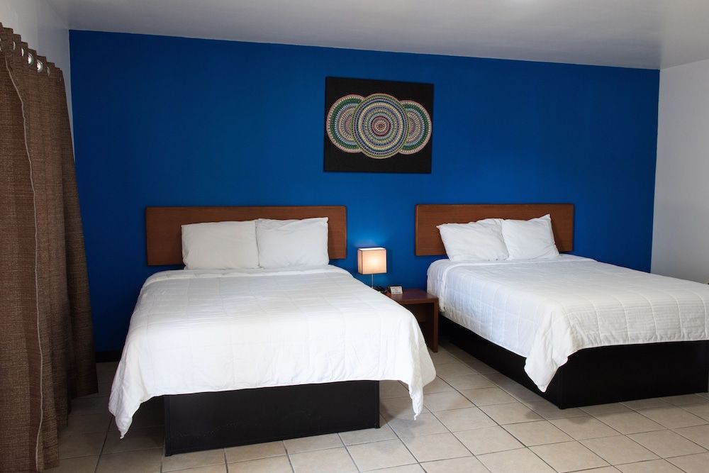 Standard Quadruple Room, 2 Queen Beds, Non Smoking, Refrigerator & Microwave