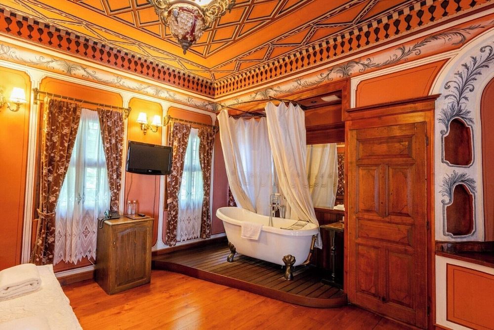 Old Legends Antique Room with ancient bathtub 6