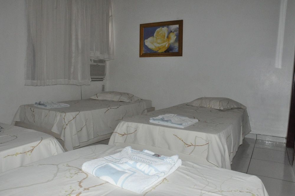 Economy Quadruple Room (4 camas solteiro)