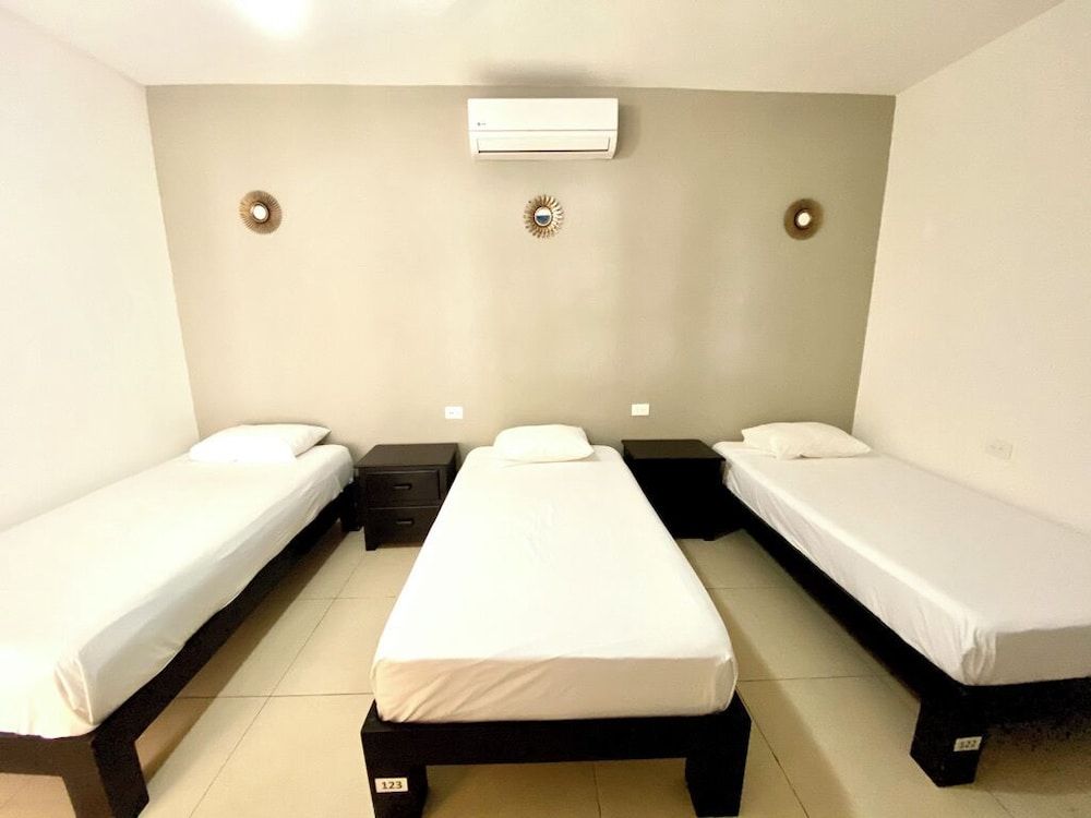 We playa Hotel - Hostel Standard Triple Room, 3 Twin Beds 3