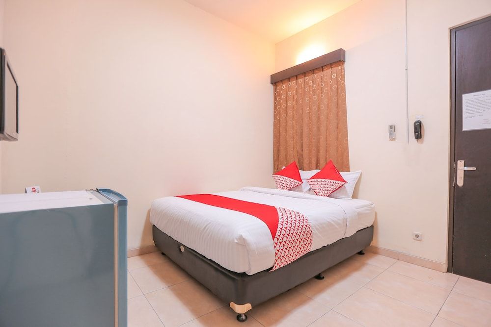 OYO 122 Oekude Kost Standard Double Room 2