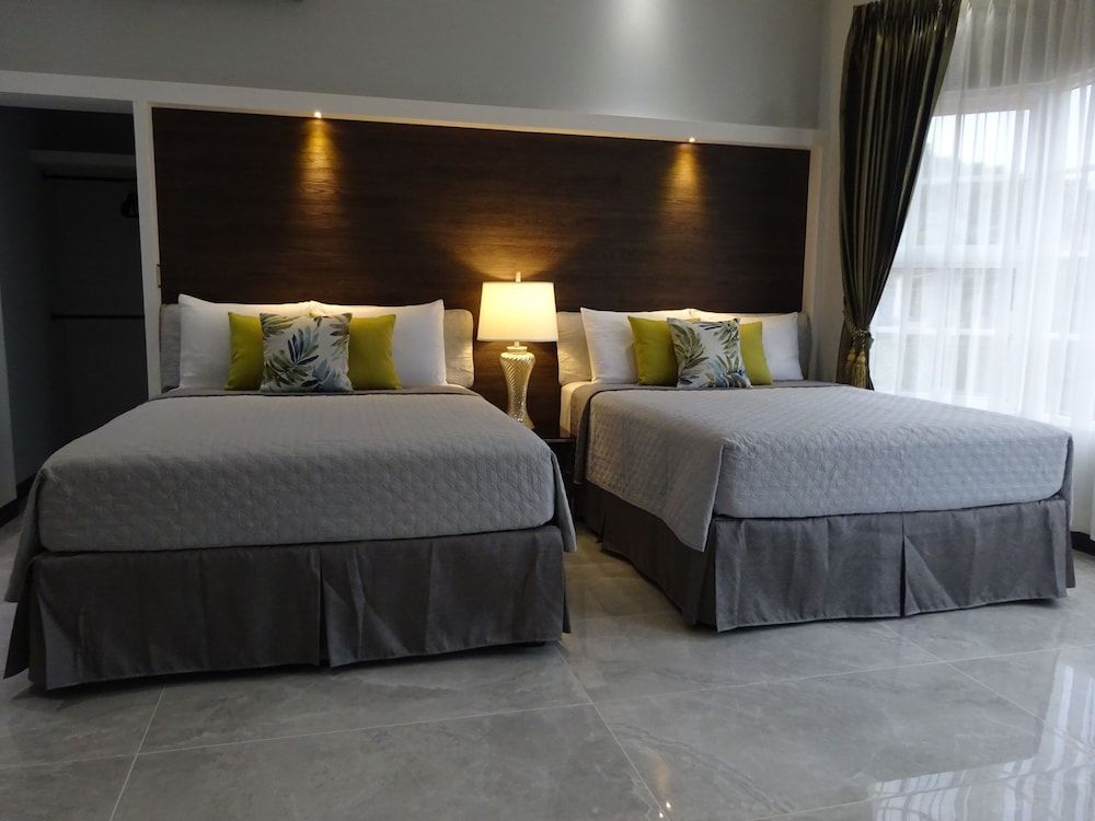 Alameda Cariari Deluxe Quadruple Room 3