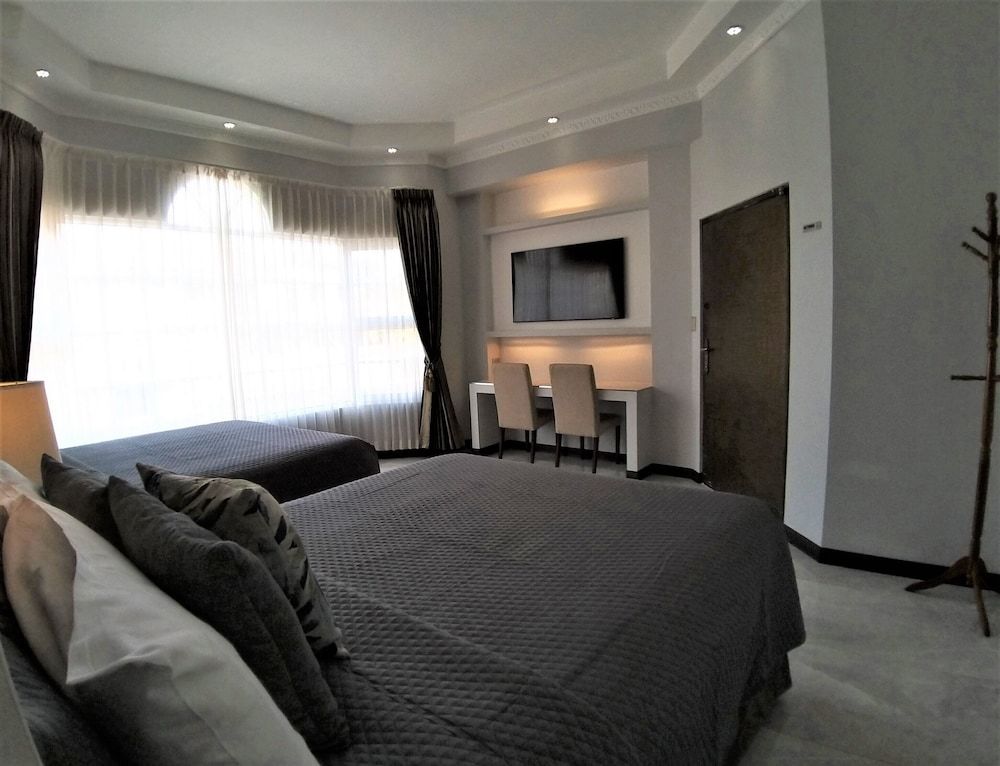 Alameda Cariari Deluxe Quadruple Room 2