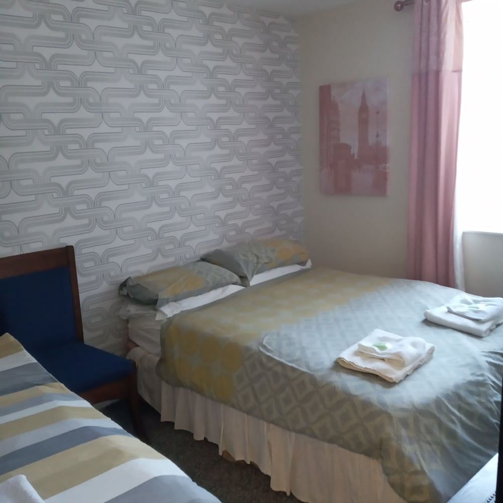 White Lodge In Traditional Quadruple Room