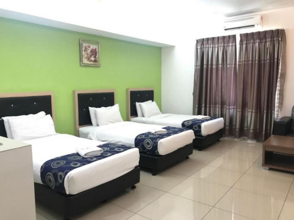Deluxe Triple Room