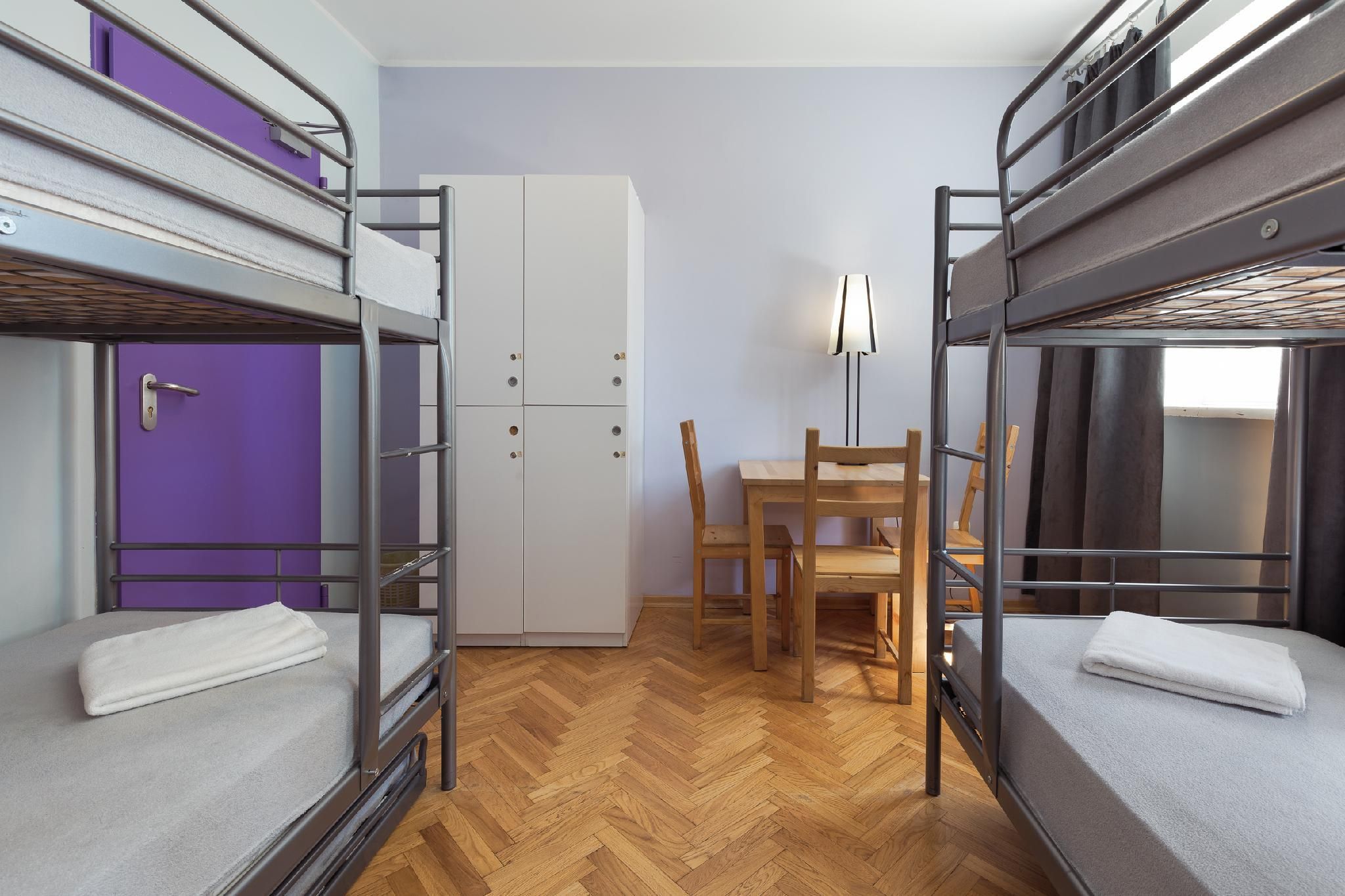 Bed in 4-Bed Dormitory Room with Shared Bathroom