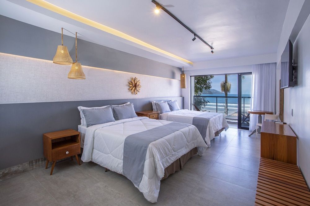 HOTEL VILLAGE ENSEADA Suite Luxo Frente Mar