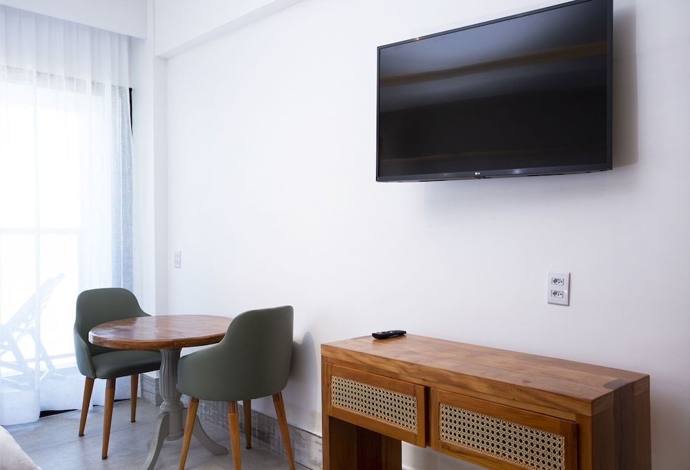 HOTEL VILLAGE ENSEADA Suite Luxo Frente Mar Casal 14