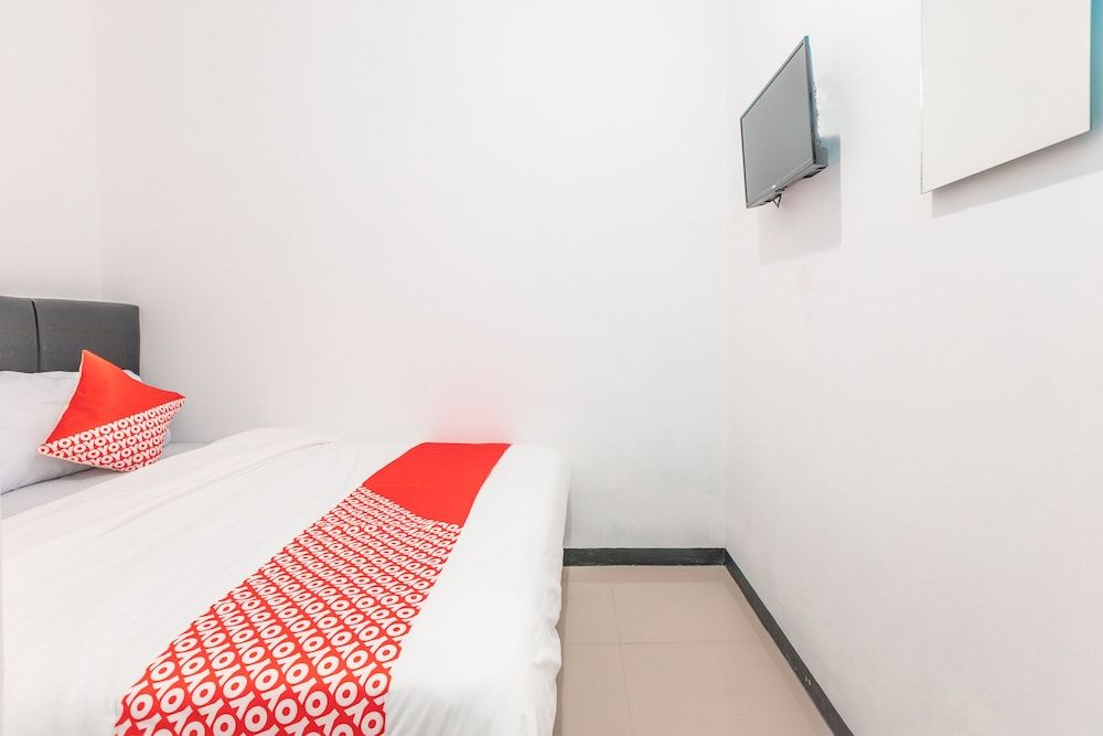 Super OYO 2223 J&b Room Utan Kayu Standard Double Room 6