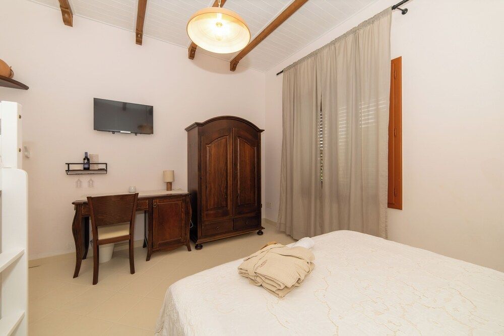 Standard Quadruple Room, Private Bathroom, Garden View