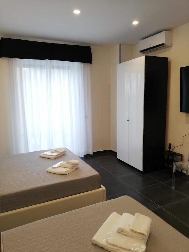 Venere Bellevue Deluxe Quadruple Room 4