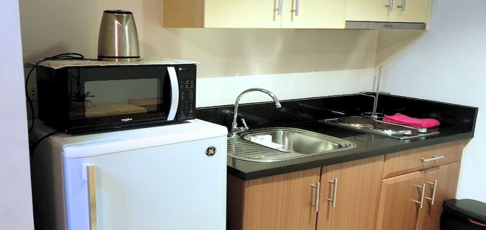 Tess and Tessha Condotel near T3 Airport Studio, 1 Queen Bed 9