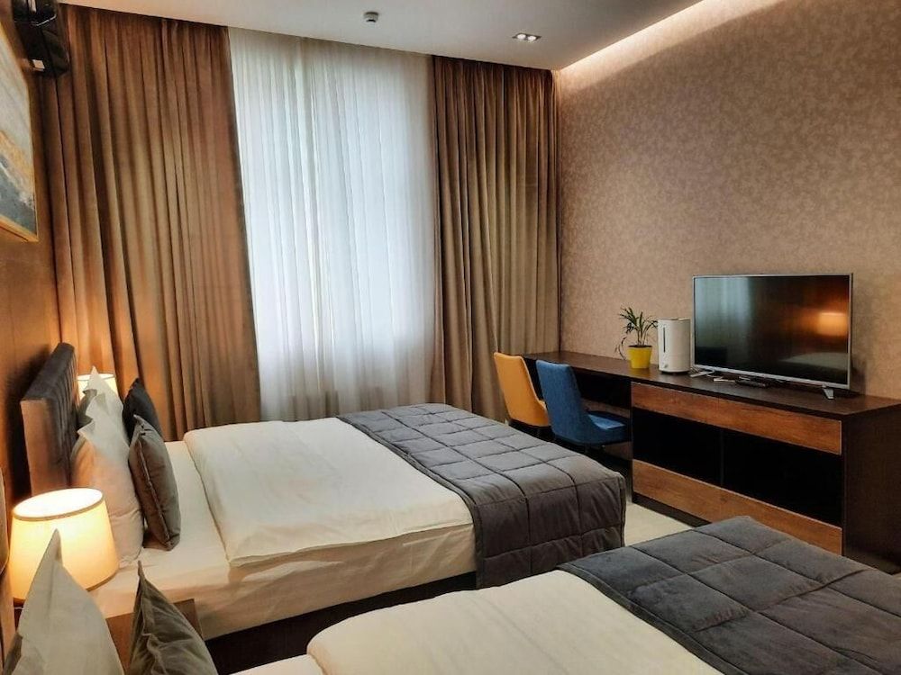 Home hotel Deluxe Triple Room 9