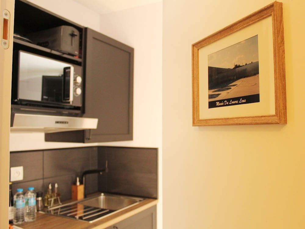 Appart Hotel Relax Spa Royal Studio, Hot Tub, Garden View 7