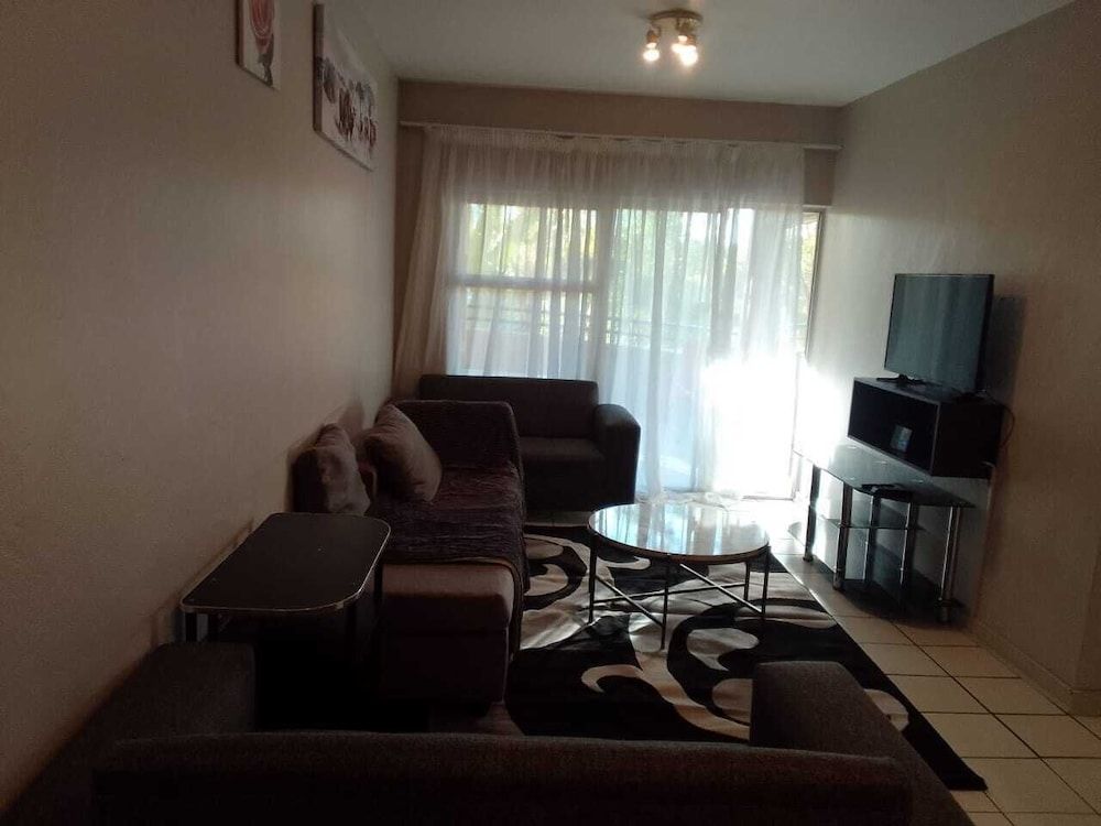 Central Sandton Apartment Family Room 25