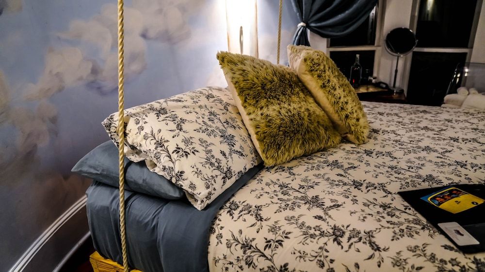 Isetta Inn (Boutique Inn) The Sacred Tower Room with Swing Bed and Shared Bath