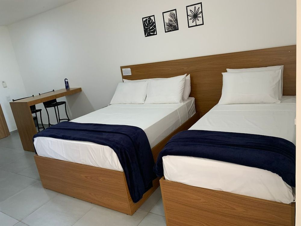 Basic Triple Room, Multiple Beds, City View