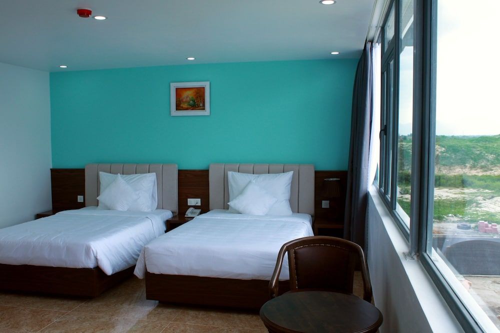 Cong Thanh Long Beach Hotel Deluxe Twin Room 4