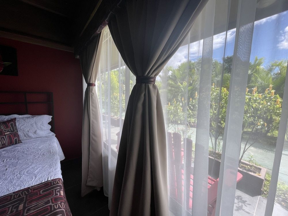 Campos Arenal Hotel Deluxe Quadruple Room, 2 Double Beds, Garden View 10