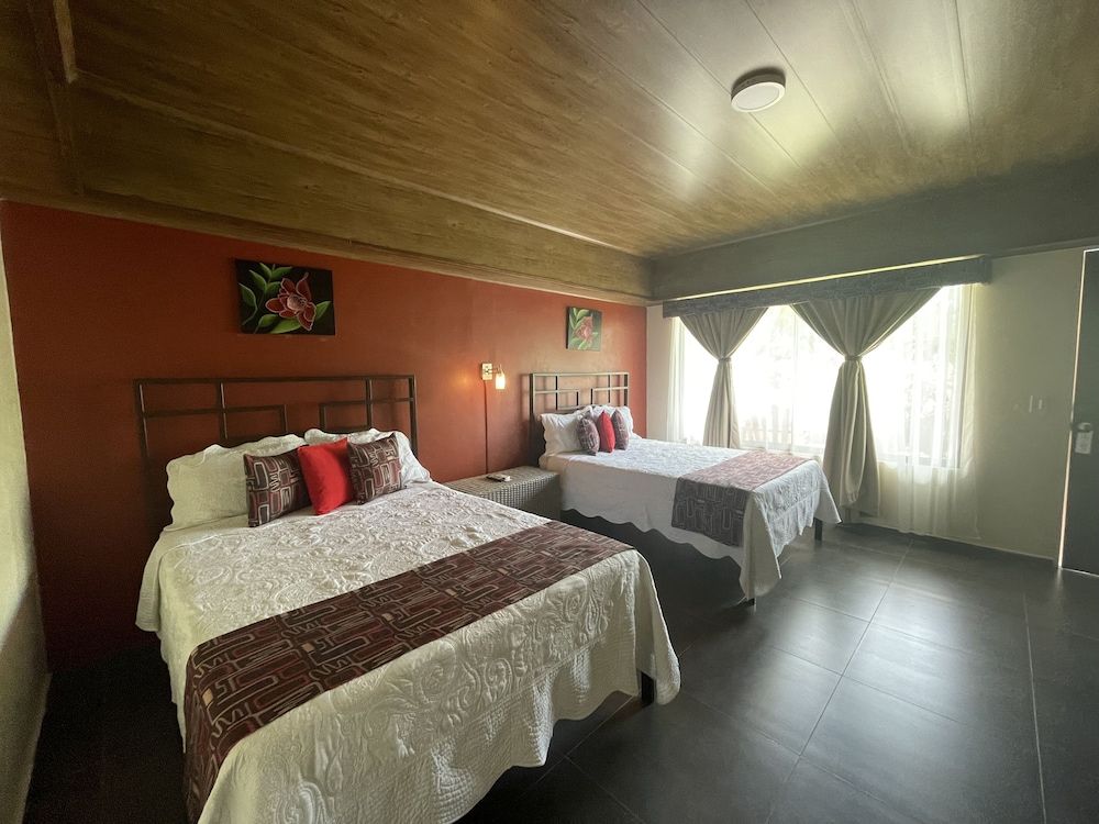 Campos Arenal Hotel Deluxe Quadruple Room, 2 Double Beds, Garden View 4