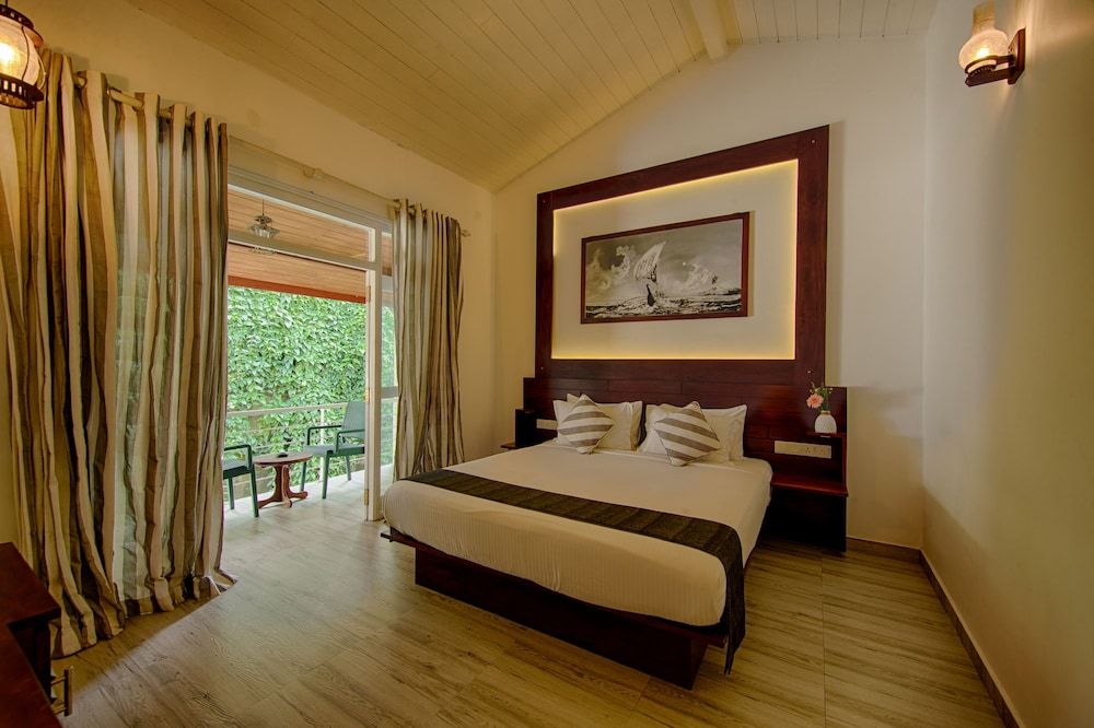 Deltora Boutique Hotel Deluxe Double Room, 1 King Bed, Patio, Garden View