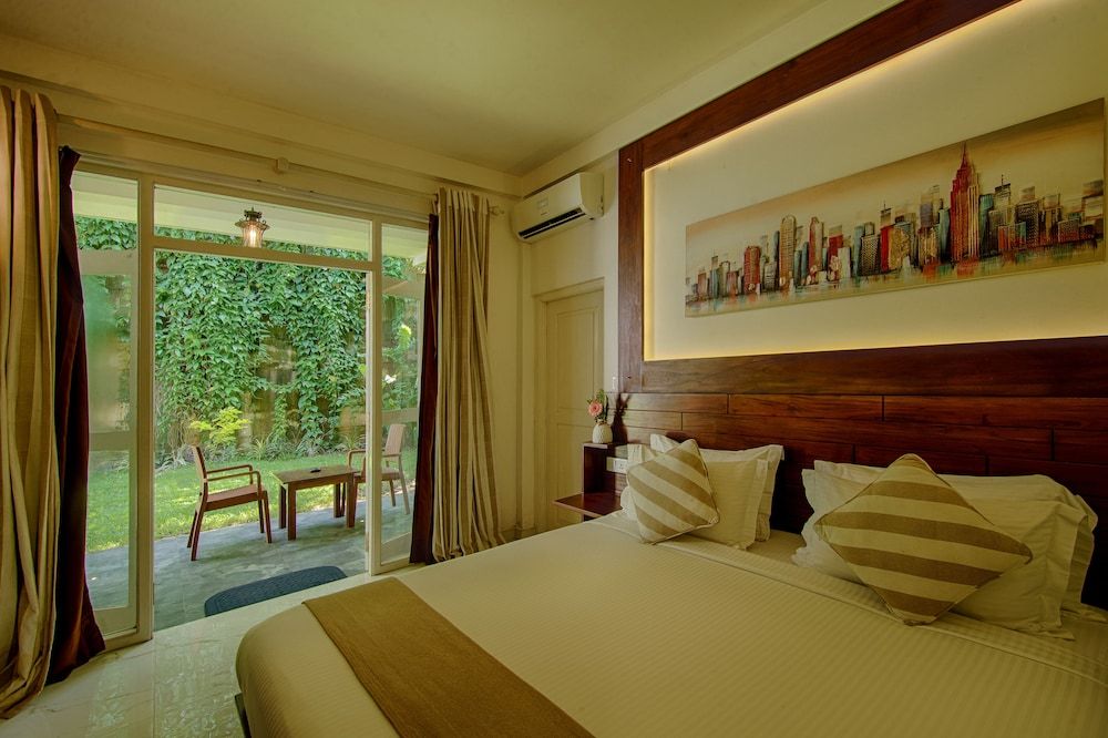 Deltora Boutique Hotel Deluxe Double Room, 1 King Bed, Patio, Garden View 2
