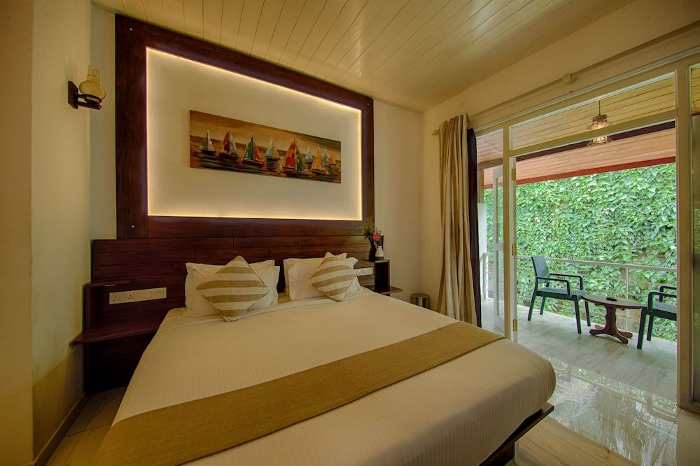 Deltora Boutique Hotel Deluxe Double Room, 1 King Bed, Non Smoking, Garden View 2