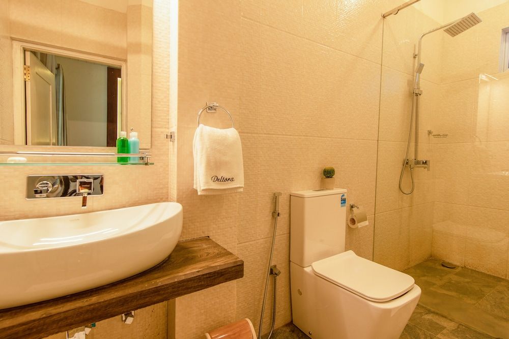 Deltora Boutique Hotel Deluxe Double Room, 1 King Bed, Patio, Garden View 4